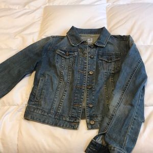 Non-distressed blue jean jacket.